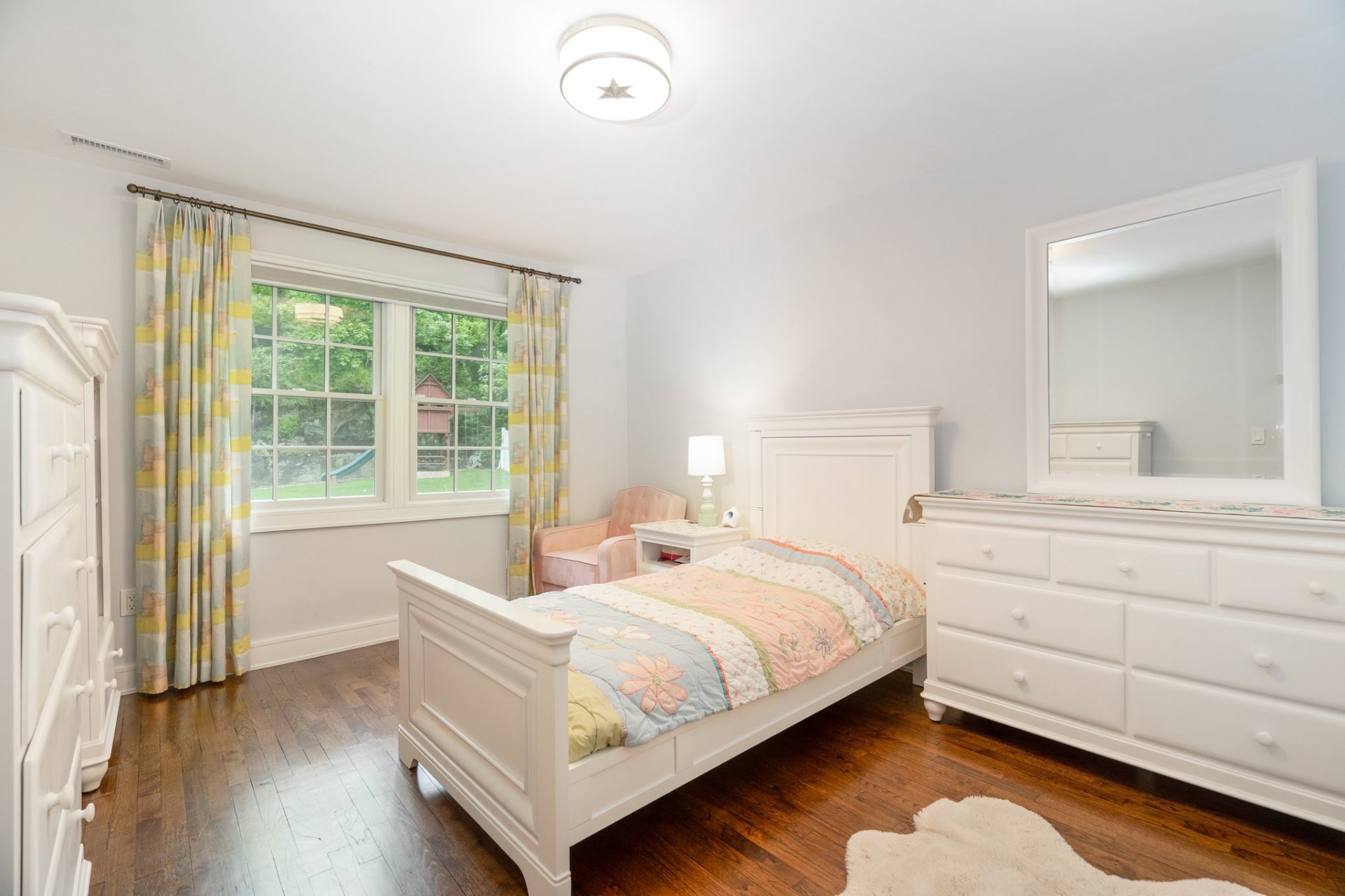Charming third bedroom with garden views