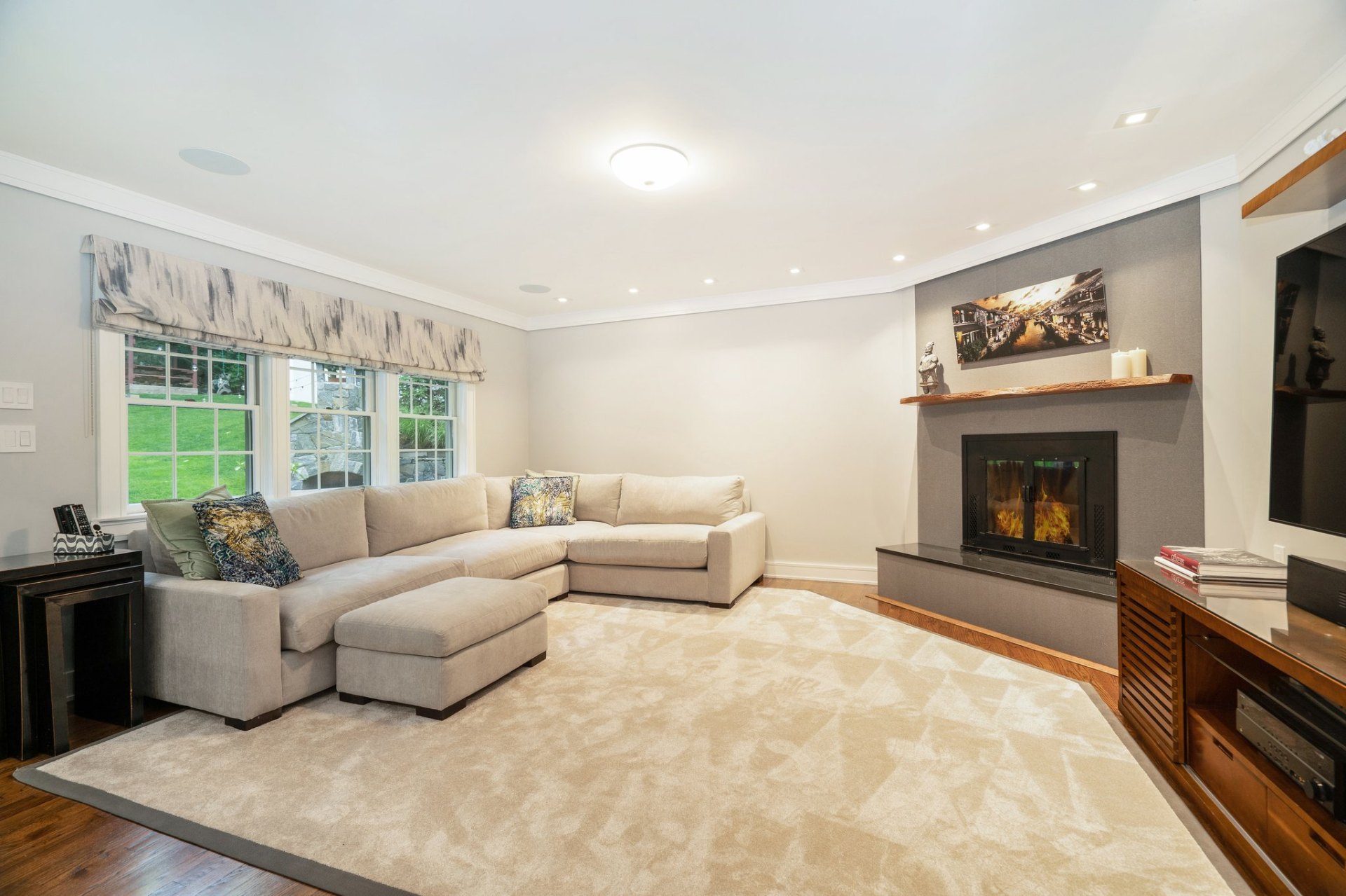 Family room with sectional sofa and fireplace
