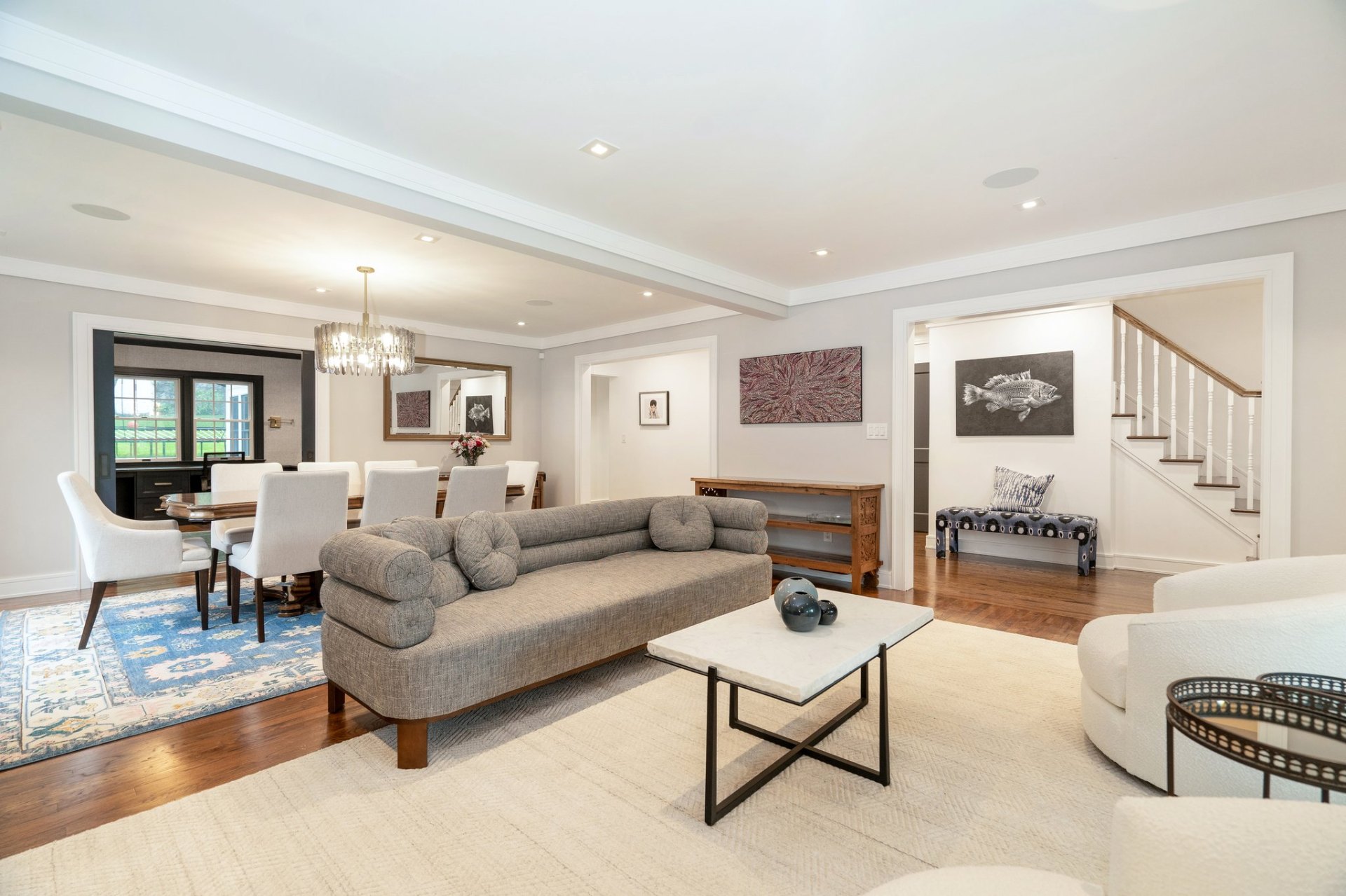 Front living room opening to formal dining