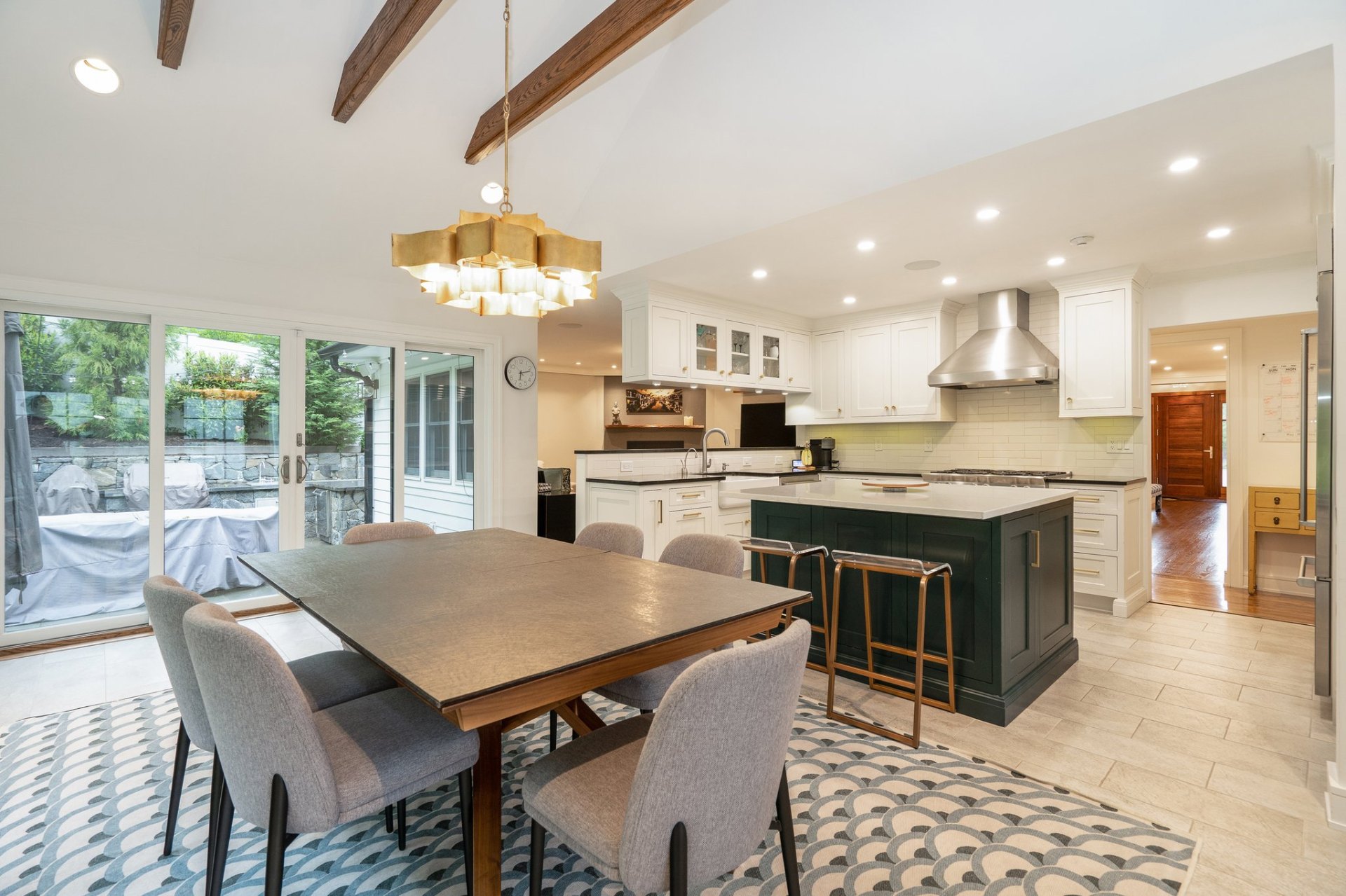 Kitchen and casual dining with vaulted beamed ceiling